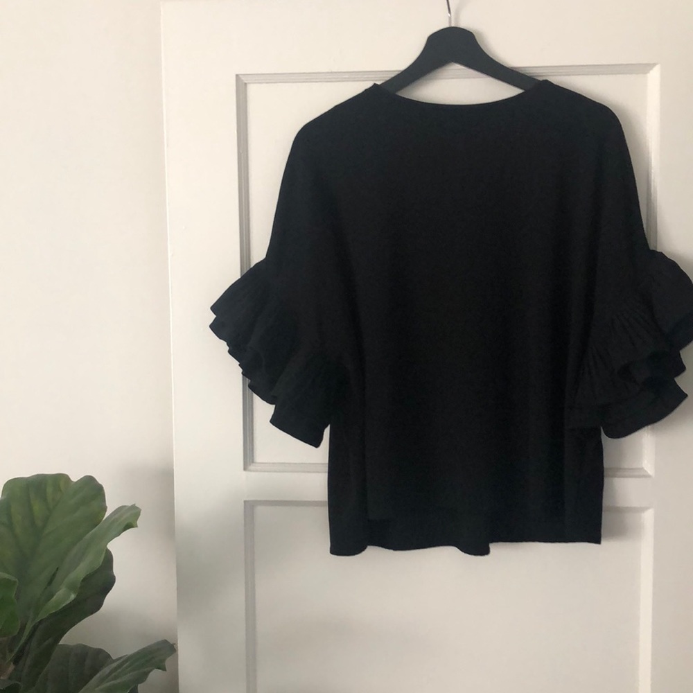 black ruffle sleeve top